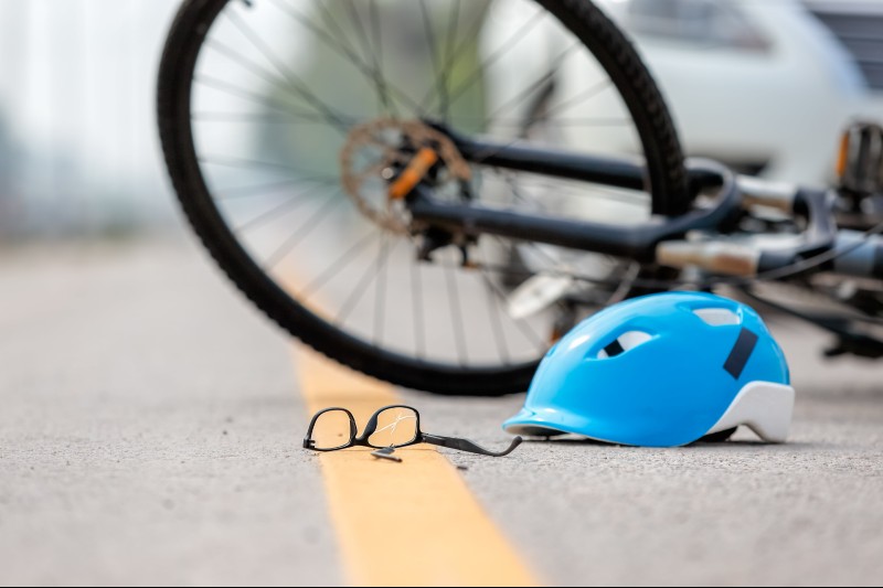 hit by a car while riding a bike